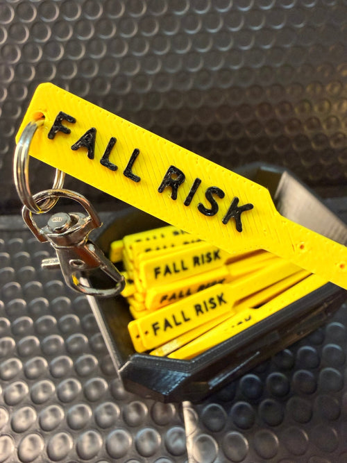 Fall Risk charm for badge reels